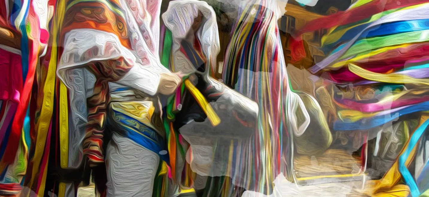 Maschere di Tricarico con copricapo di nastri colorati durante la sfilata del 17 gennaio